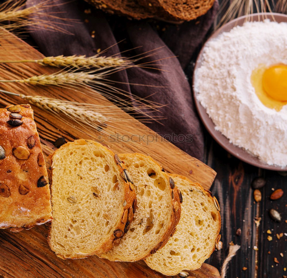 Similar – fresh bread and baked goods on wooden