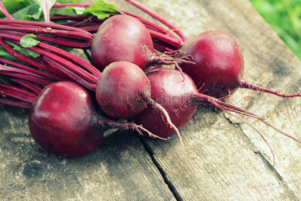 Image, Stock Photo Various beetroot on old wood