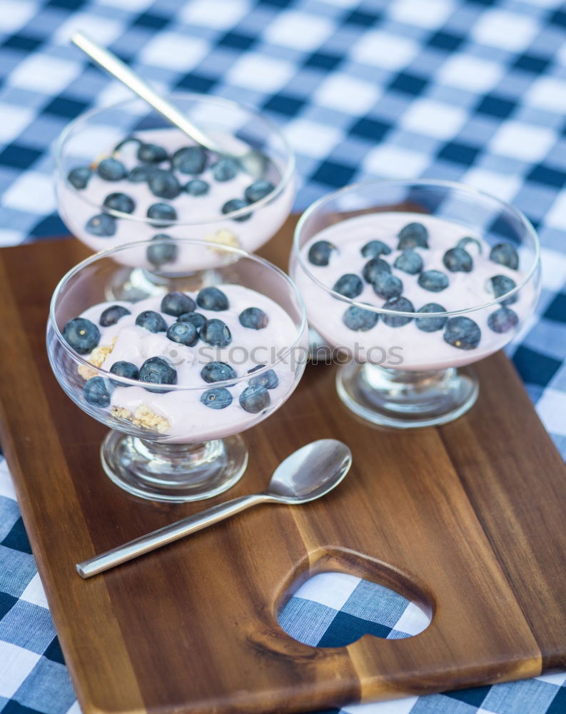 Similar – Image, Stock Photo Blueberries and yogurt chia pudding parfait