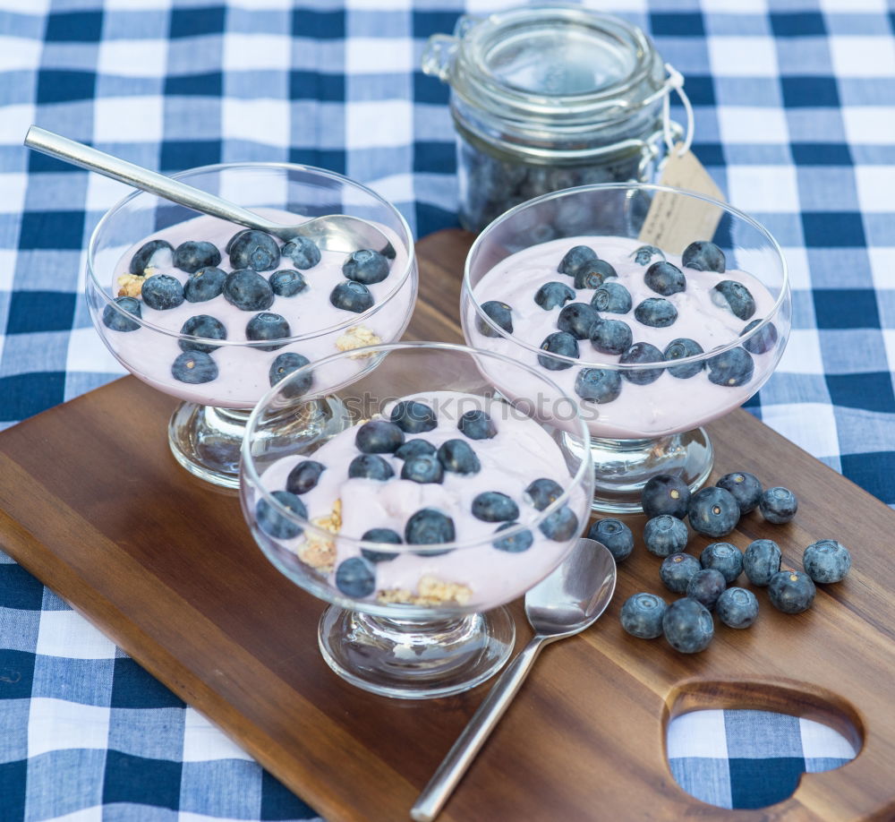 Similar – Image, Stock Photo Blueberries and yogurt chia pudding parfait