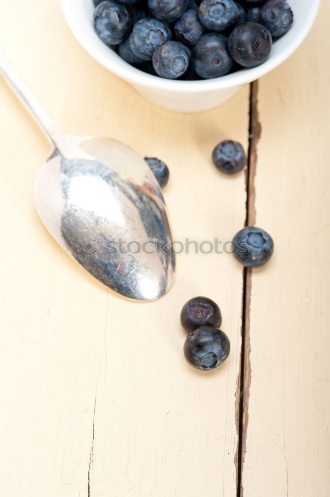 organic fresh blueberry and cereal with milk