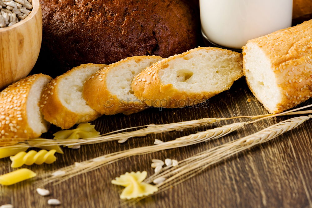 Similar – fresh bread and baked goods on wooden