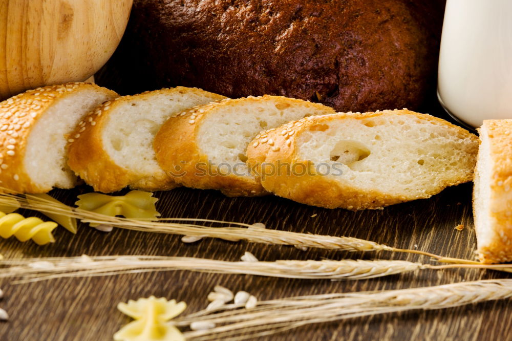 Similar – fresh bread and baked goods on wooden