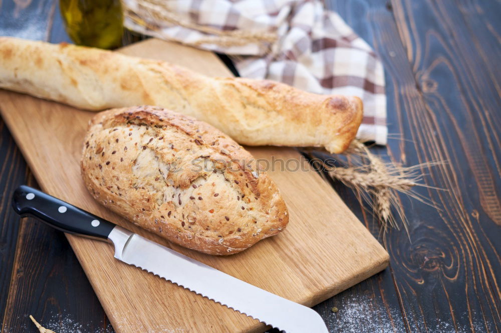 Similar – fresh bread and baked goods on wooden