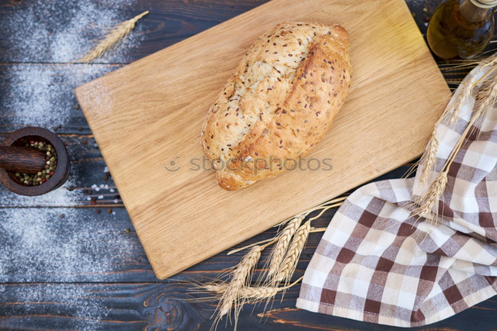 Similar – fresh bread and baked goods on wooden