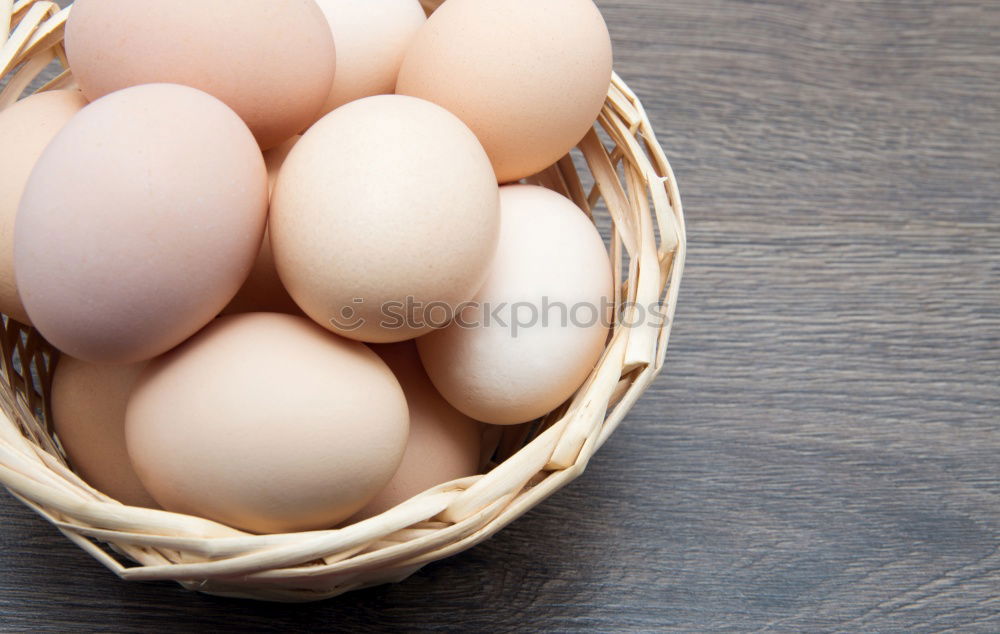 Similar – Image, Stock Photo Fresh eggs in a cardbox tray.