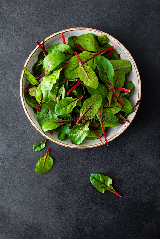 Similar – spinach in a round cast-iron frying pan