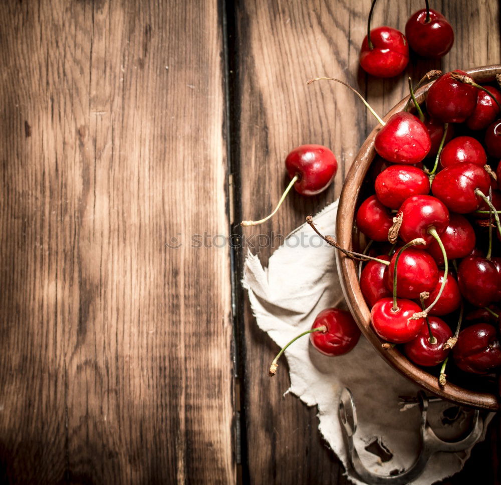 Similar – Image, Stock Photo Ripe red cherry in a paper bag