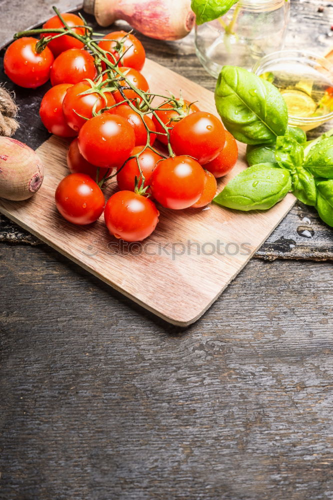 Similar – spaghetti and red cherry tomatoes