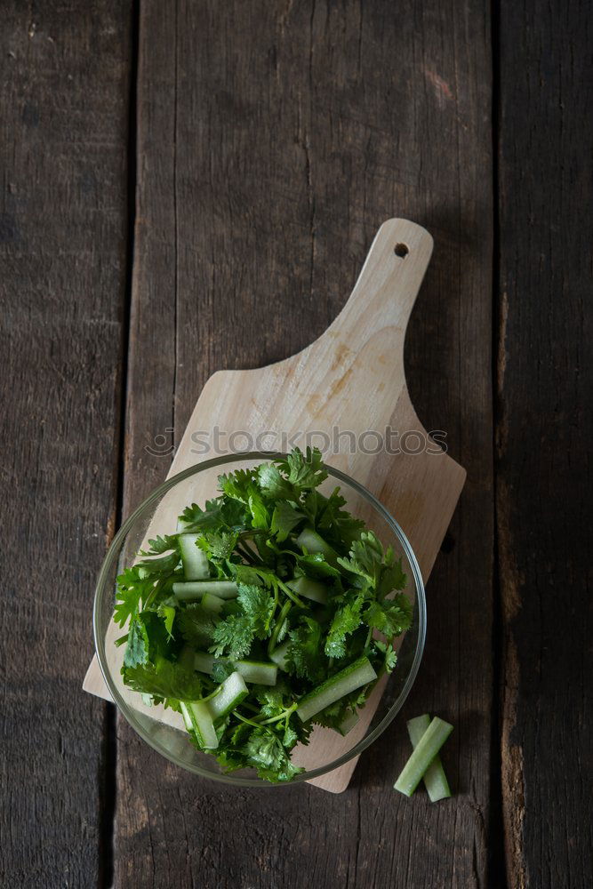 Similar – spinach in a round cast-iron frying pan