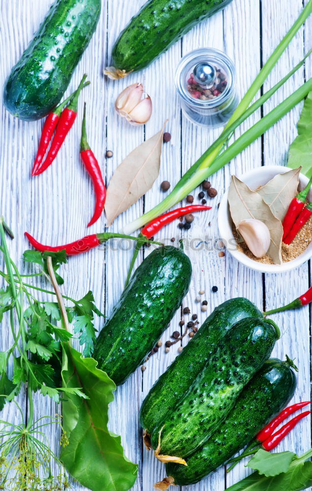 Similar – Pickling cucumbers with home garden vegetables and herbs