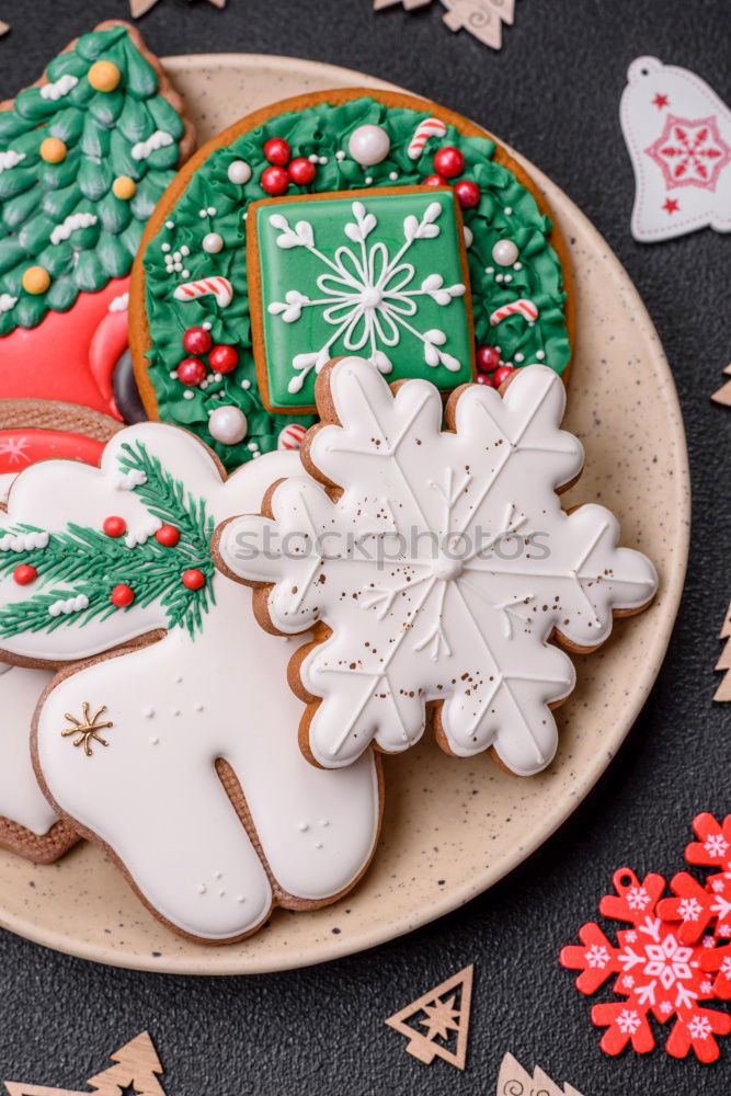 Similar – Christmas cookies on a dish with a wooden table background