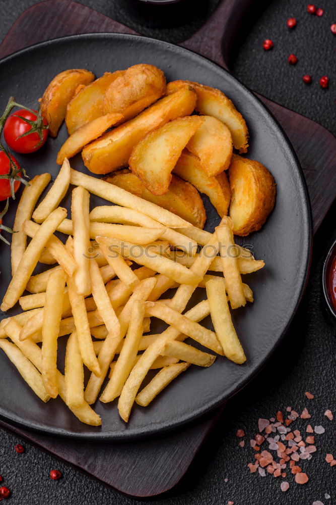 Similar – Salchipapas (Fries with Sausage) South American Fast Food