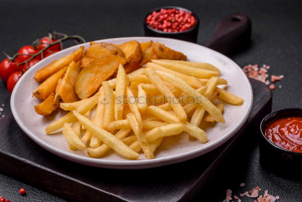 Similar – Salchipapas (Fries with Sausage) South American Fast Food