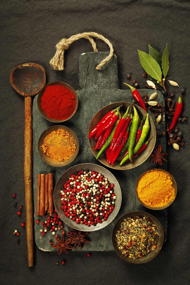 Similar – Image, Stock Photo Colourful spices on the kitchen table