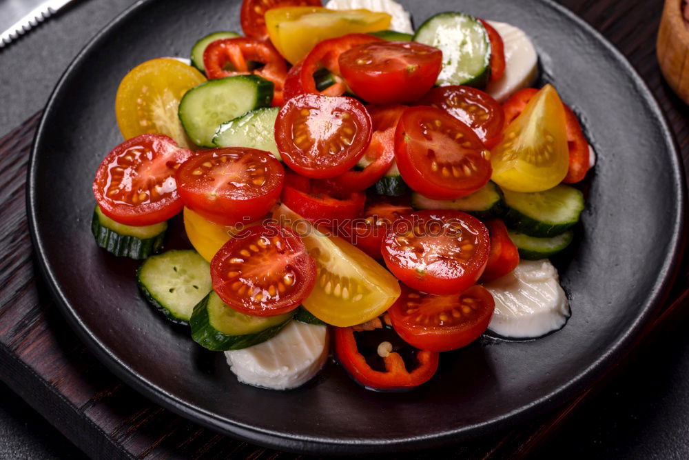 Similar – Image, Stock Photo Classic salad with tomatoes and mozzarella