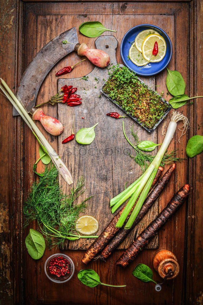 Similar – Image, Stock Photo Vegetables and herbs for cooking around empty chopping board