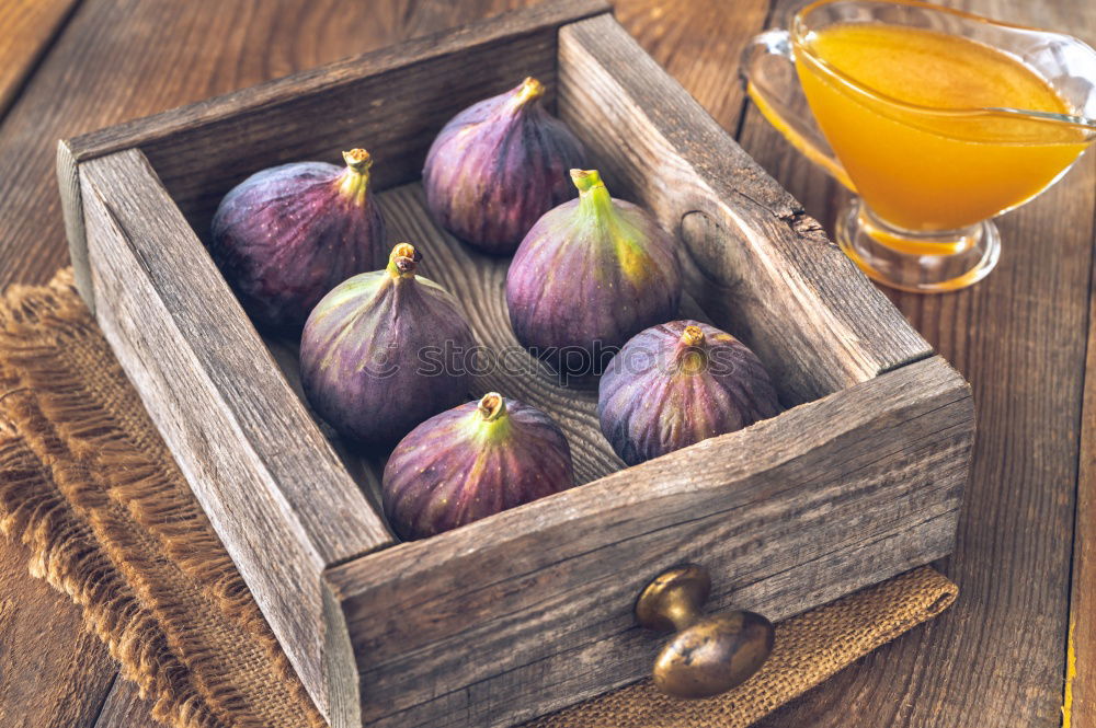 Similar – Image, Stock Photo Ripe yellow pears are scattered on the table