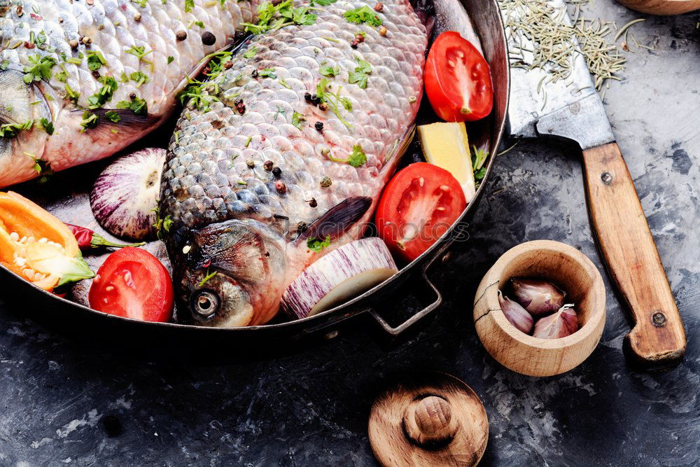 Similar – Fish fillet preparation with vegetables, fennel seeds and spices