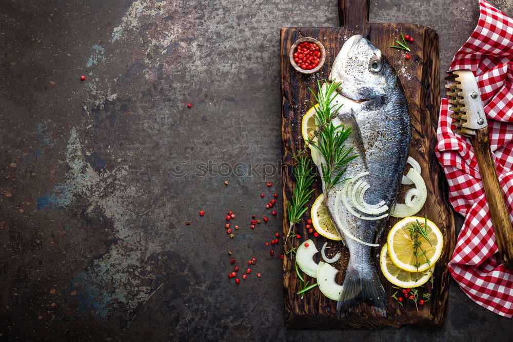 Similar – Fish fillet preparation with vegetables, fennel seeds and spices