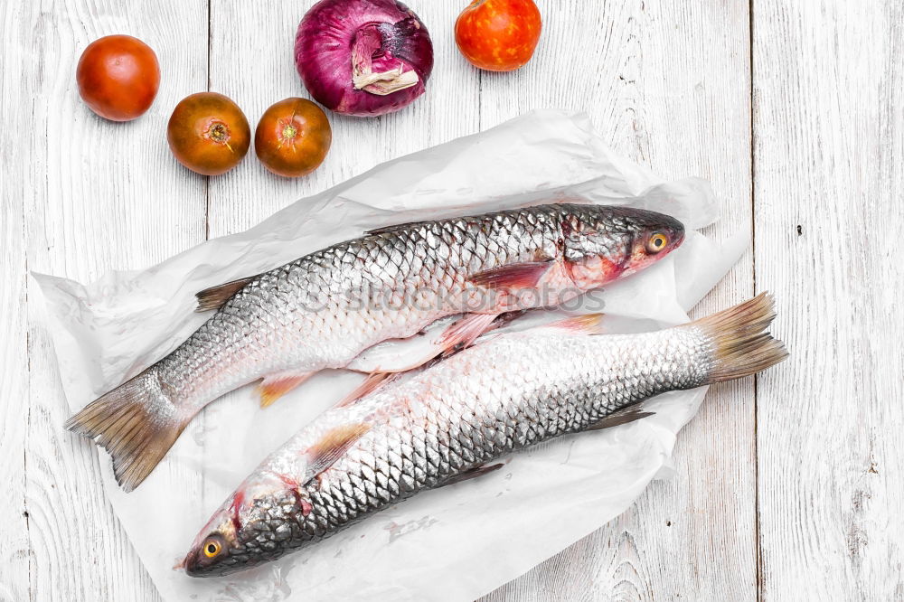 Similar – Image, Stock Photo Fresh char with ingredients for fish dishes