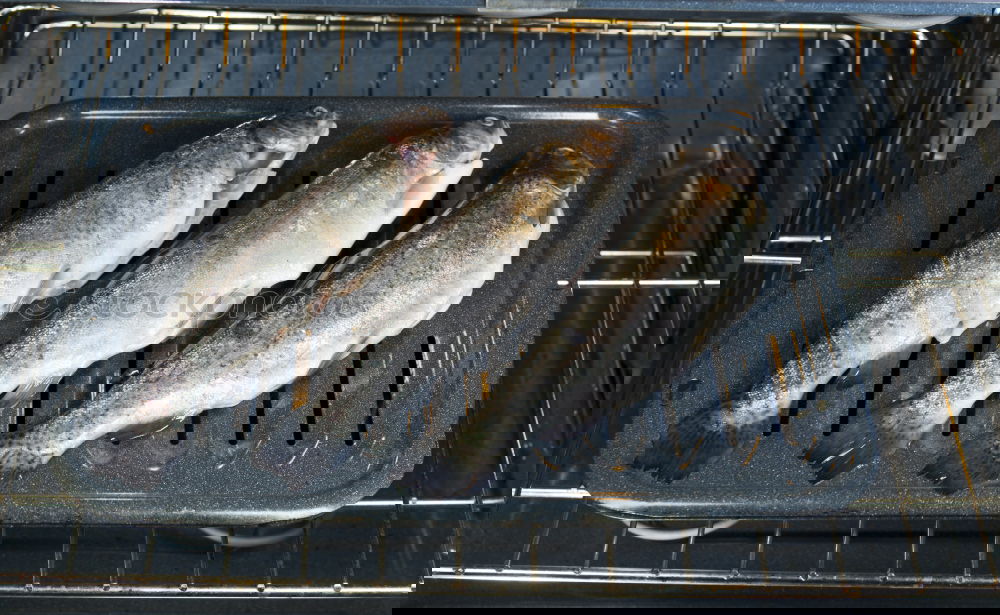 Similar – Image, Stock Photo Fried fish fillet on cast iron pan