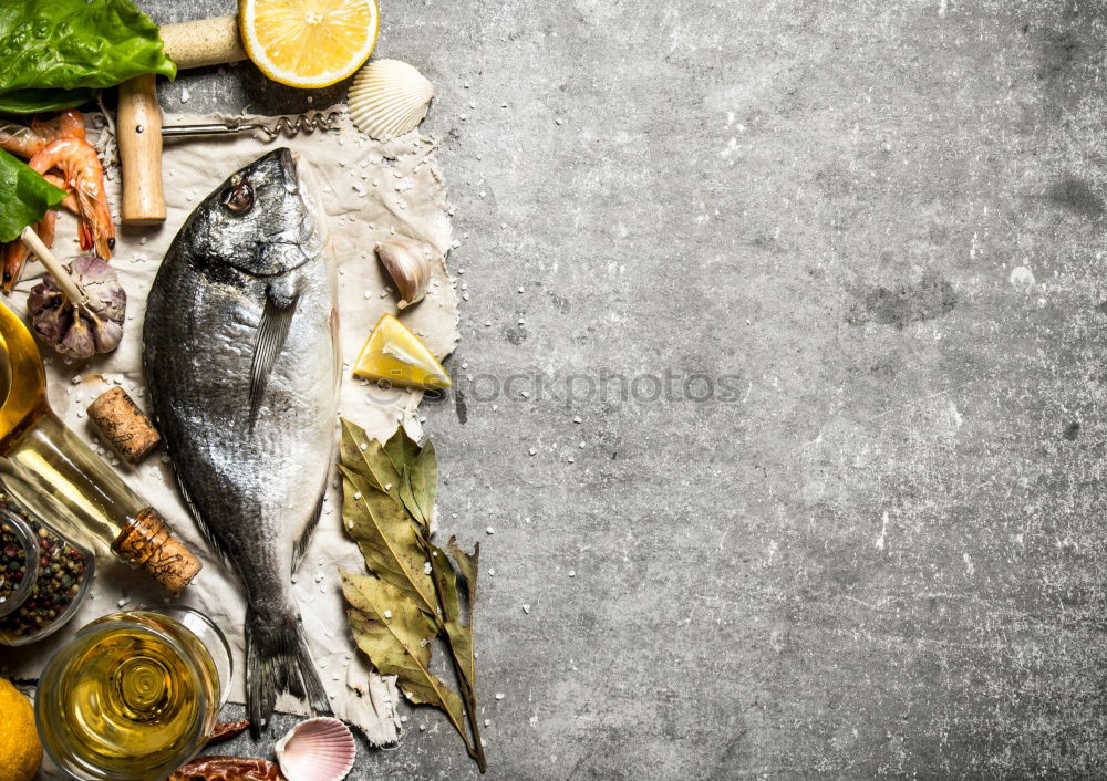 Similar – Image, Stock Photo Raw salmon fish in ice and vegetables