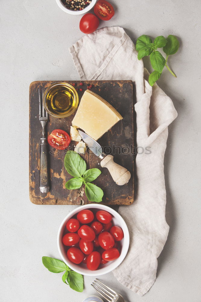 Similar – Delicious cheese platter with berries and honey