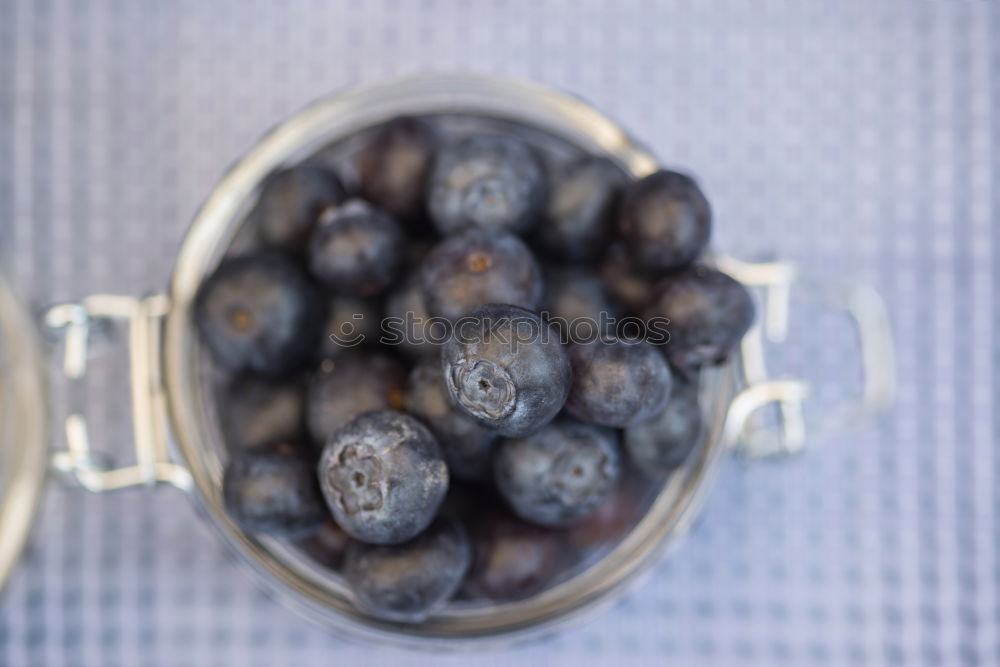 Similar – Image, Stock Photo Group of quail eggs in a gray textile napkin