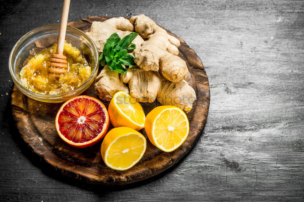 Smoothie bottle with orange ingredients