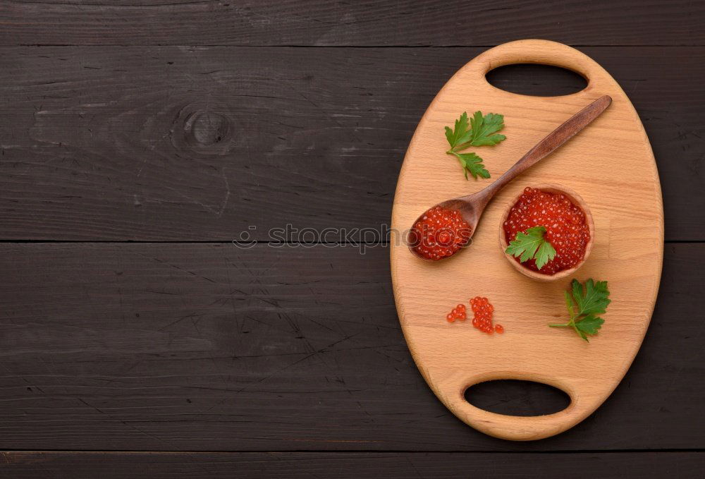 Similar – Image, Stock Photo Sliced cherry tomatoes on cutting board