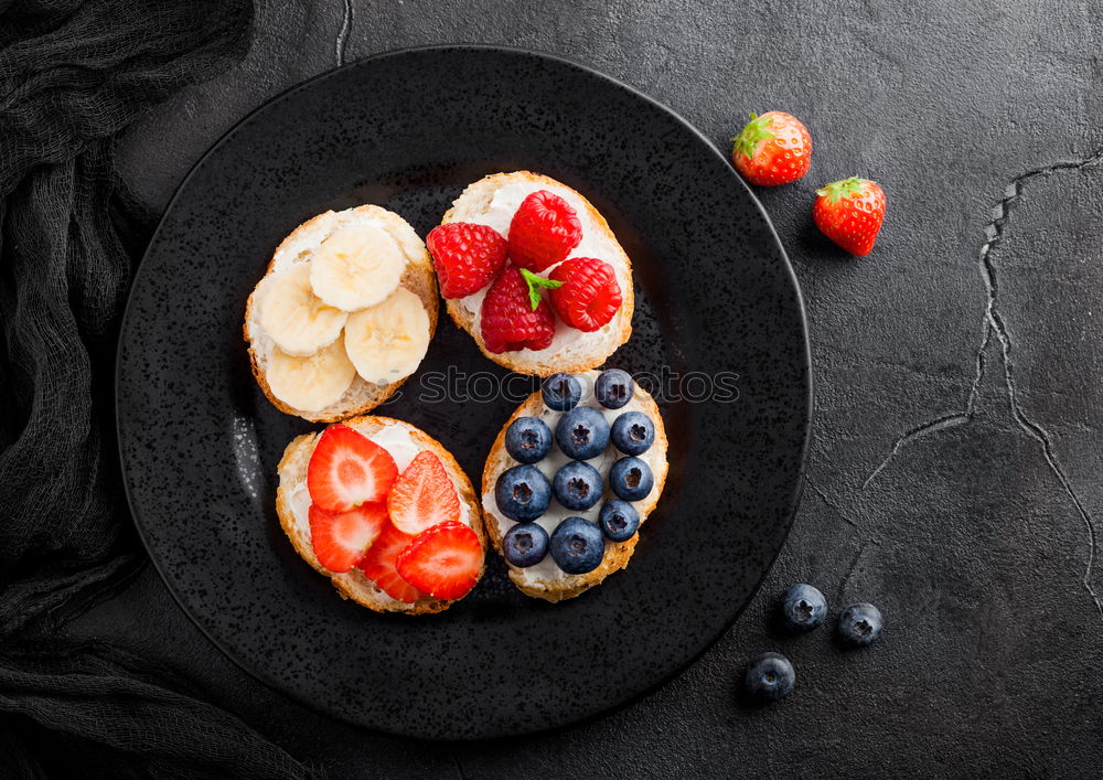 Delicious tartlets with raspberries and blueberries