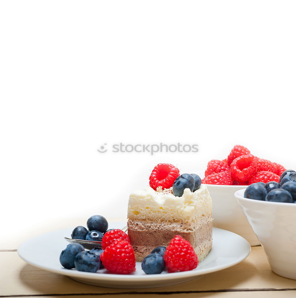 Similar – Delicious tartlets with raspberries and blueberries