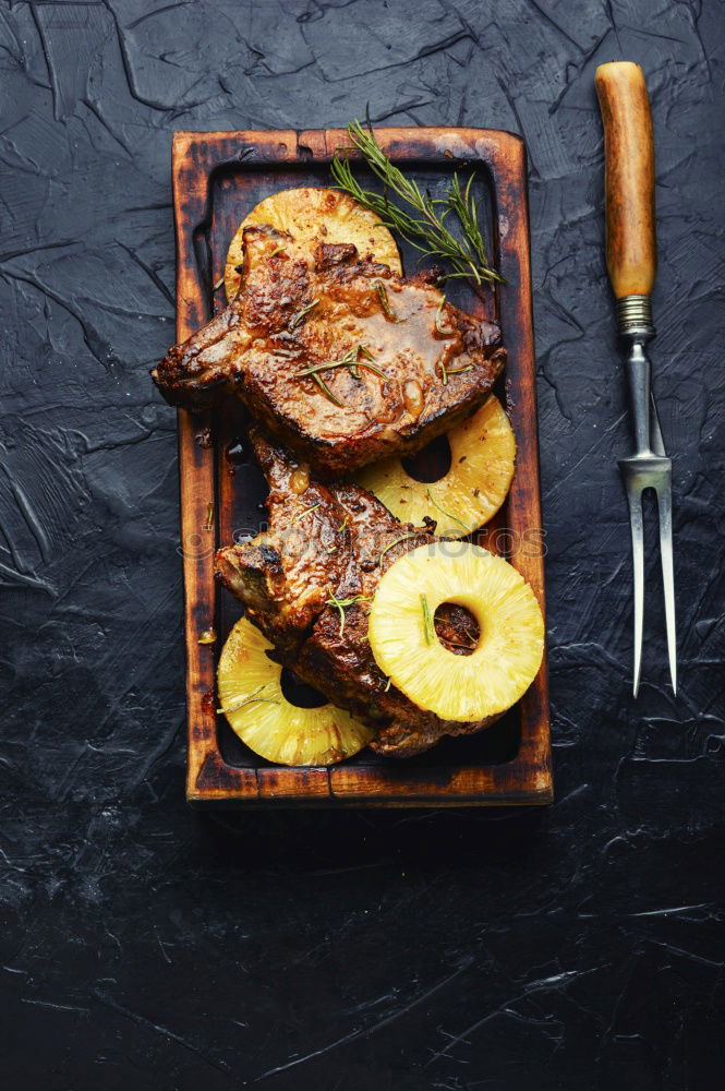 Similar – Image, Stock Photo Roasted pork fillet with crust and baked potatoes