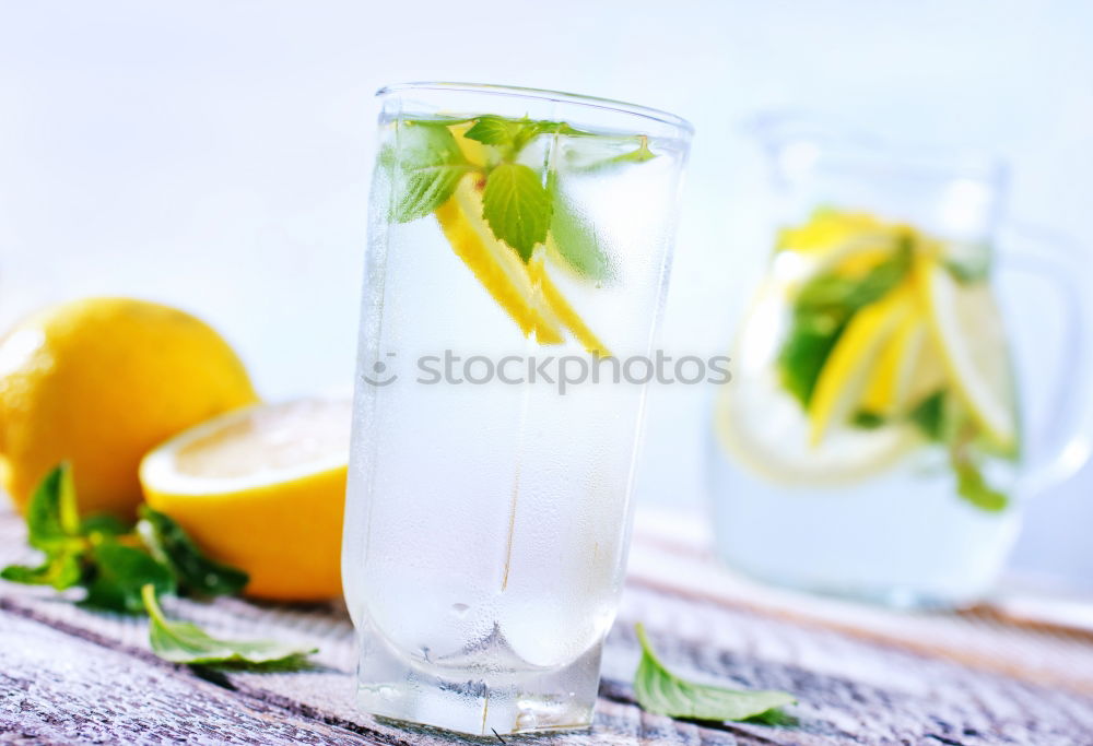 Similar – Elder lemonade with lemon on old table wood