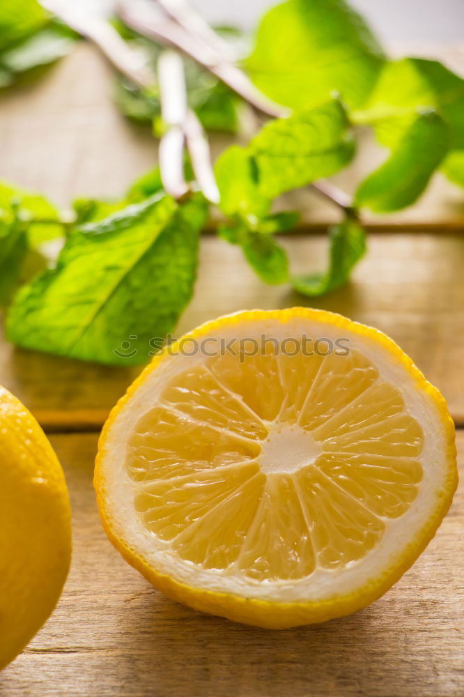 Similar – Image, Stock Photo ripe yellow lemons and lime, mint green