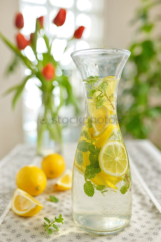 Similar – Elder lemonade with lemon on old table wood