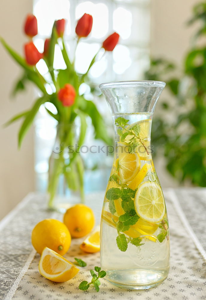 Similar – Elder lemonade with lemon on old table wood