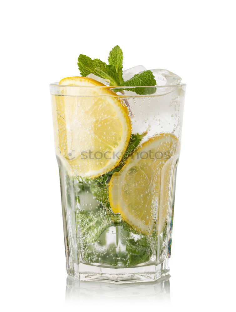 Similar – Cool soft drink with mineral water, tangerine, cucumber slices, ice cubes and green straw