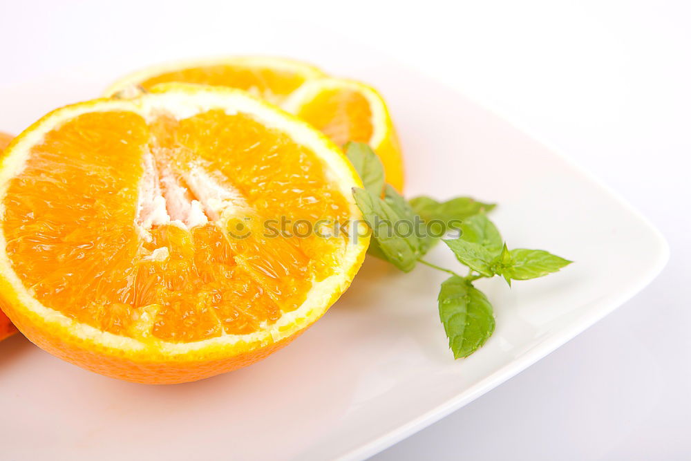 Similar – Image, Stock Photo Cut orange with green leaves