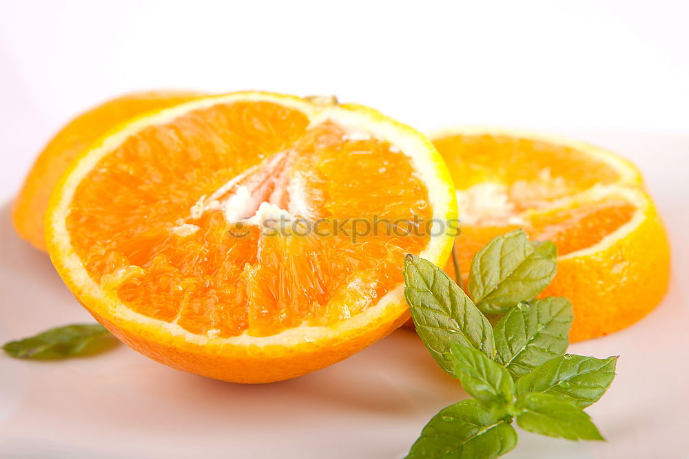 Similar – Image, Stock Photo Cut orange with green leaves