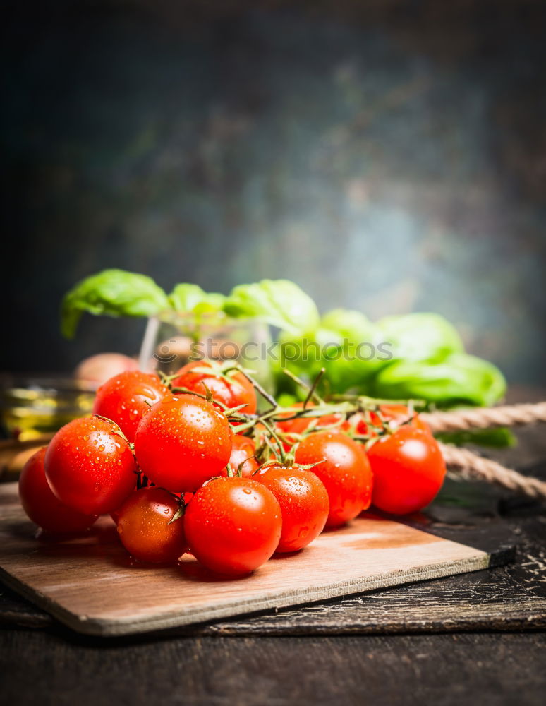 Similar – Fresh red tomatoes with herbs