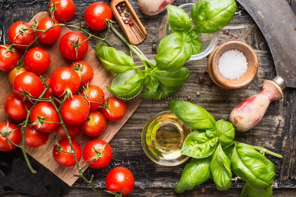 Similar – Fresh red tomatoes with herbs