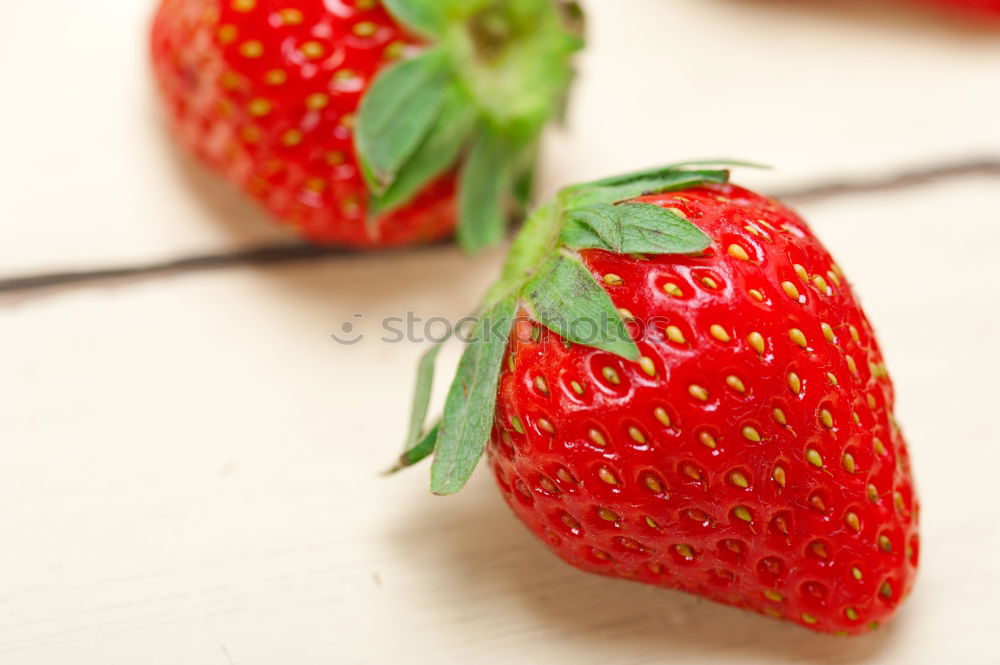 Similar – Strawberries on a wooden board with empty space