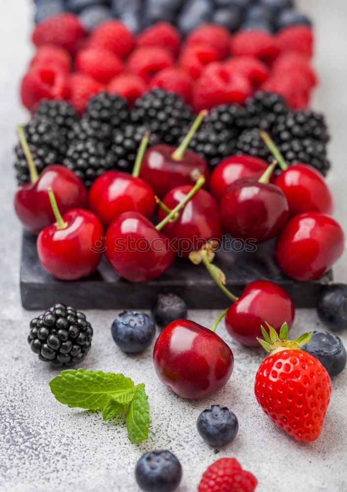 Image, Stock Photo Red and black raspberry and blueberry