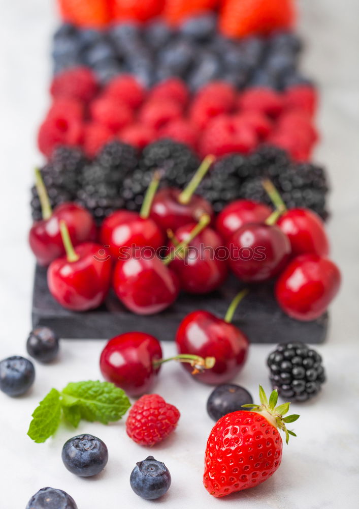 Similar – Image, Stock Photo Various berries in painted jam jar