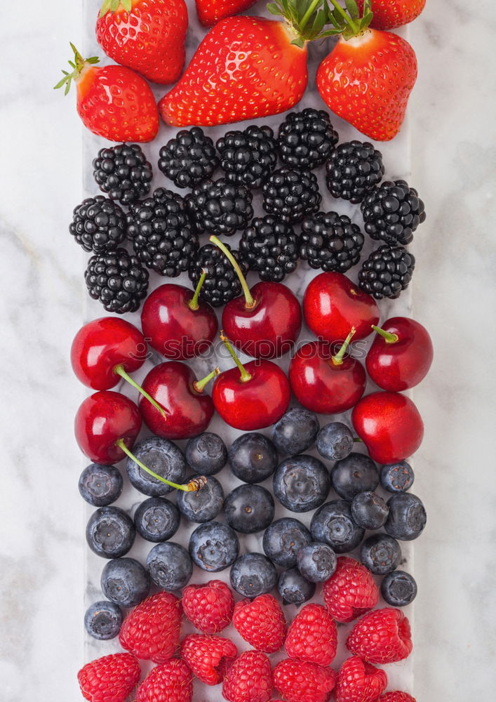 Similar – Image, Stock Photo Red and black raspberry and blueberry