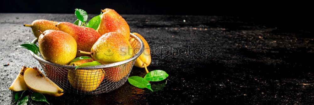 Zucchini with flowers on a dark background top view