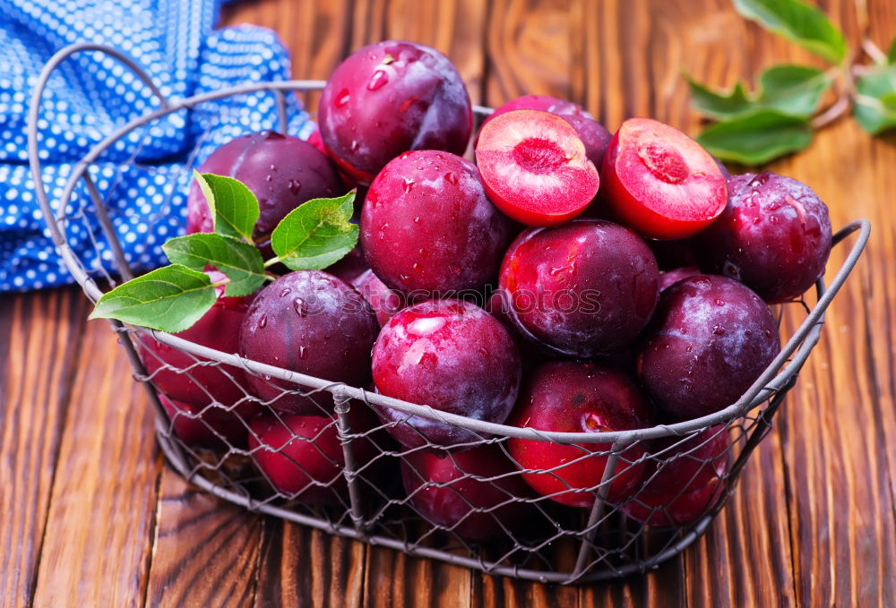 Similar – Image, Stock Photo Fresh plums with leaves