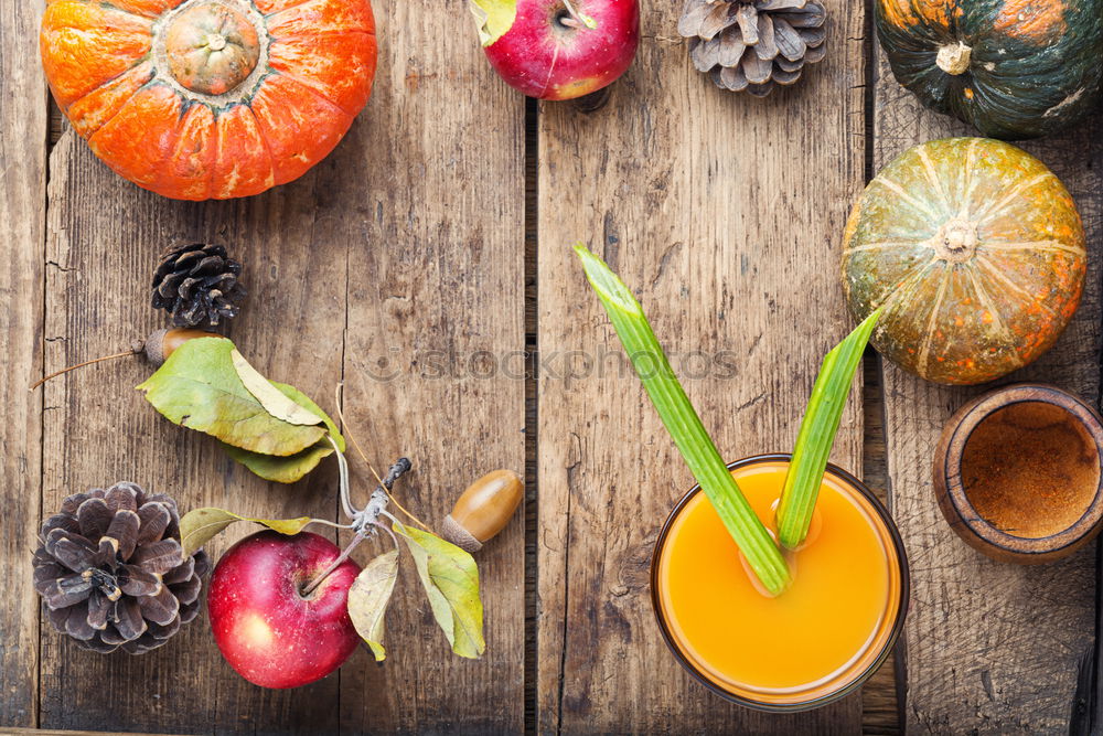 Similar – Juice in a mug on a gray wooden surface